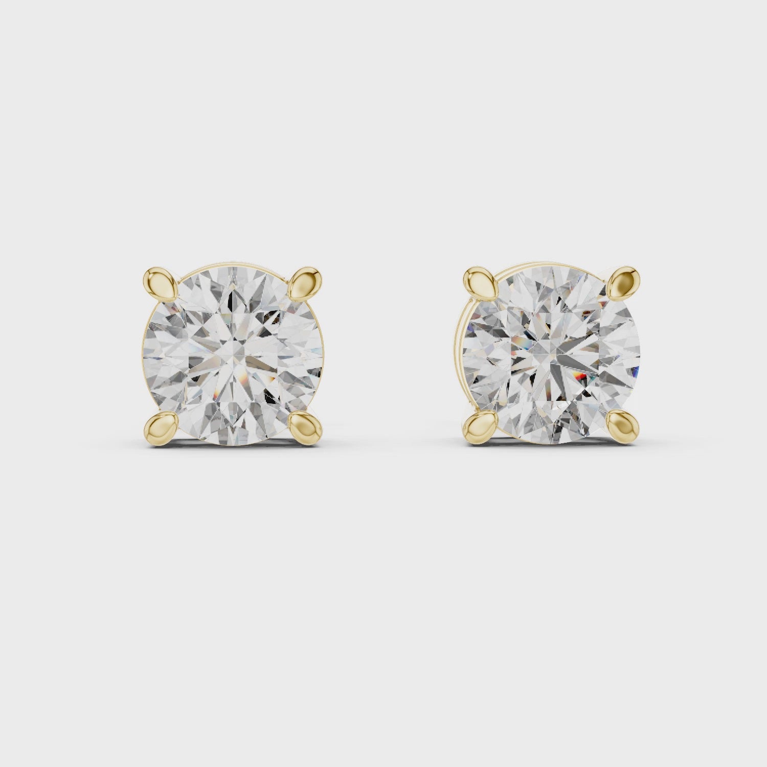 Round Diamond Four Prong Stud Earrings