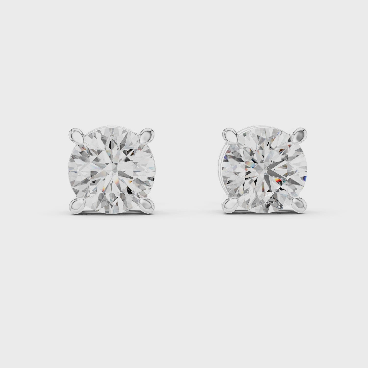 Round Diamond Four Prong Stud Earrings