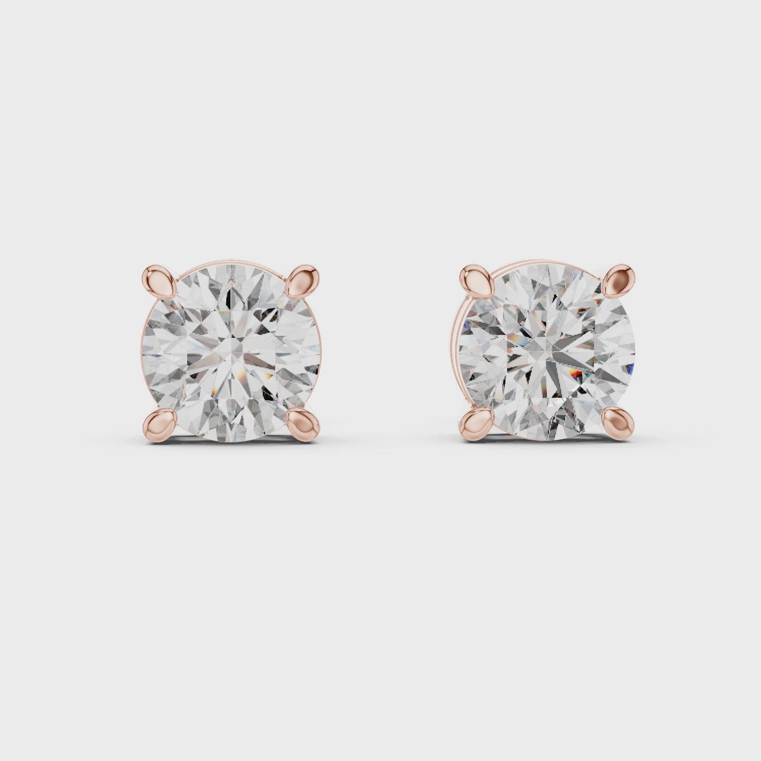 Round Diamond Four Prong Stud Earrings