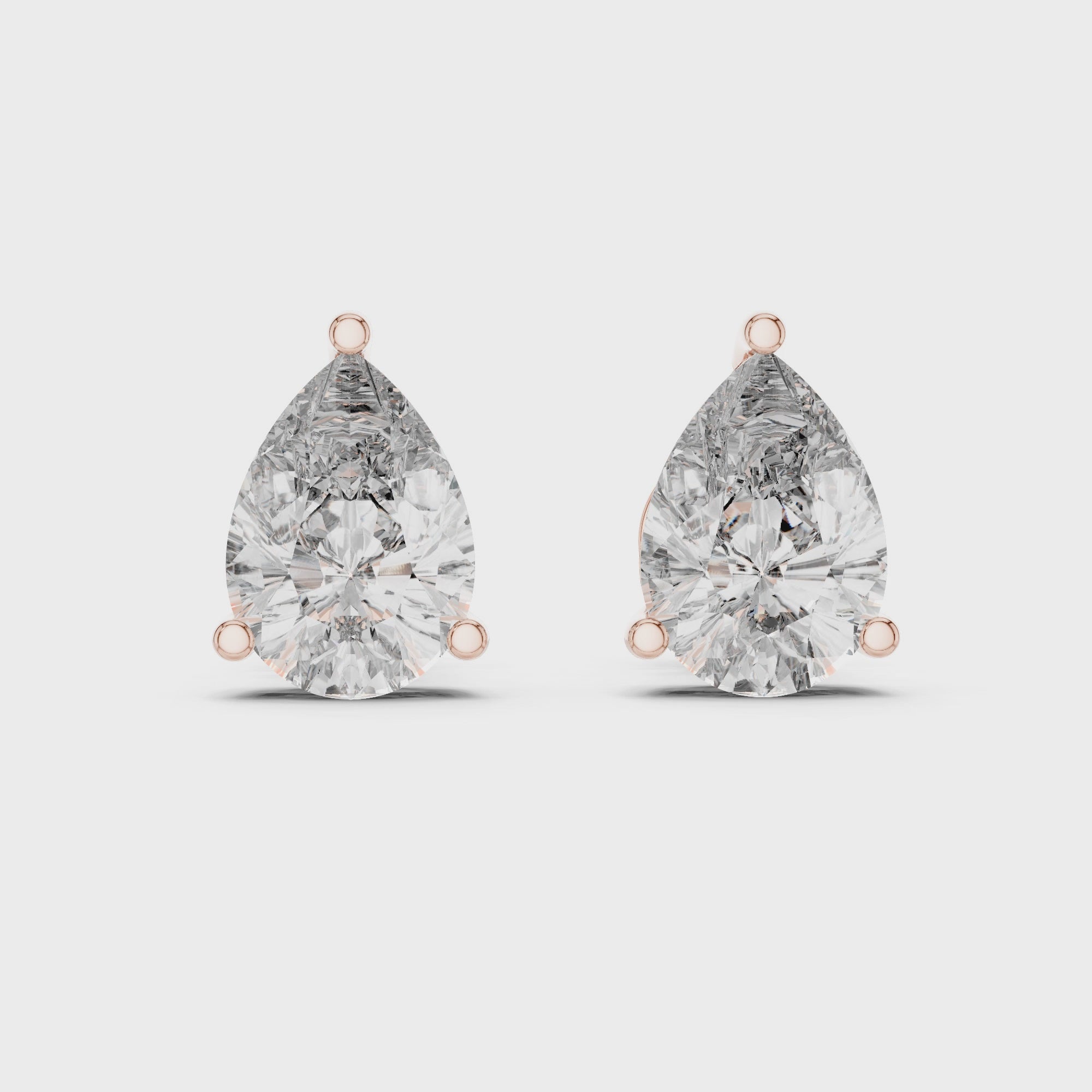 1Pear Shape Diamond Stud Earrings